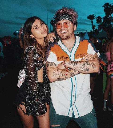 JC Caylen and Chelsey Amaro pose a picture.